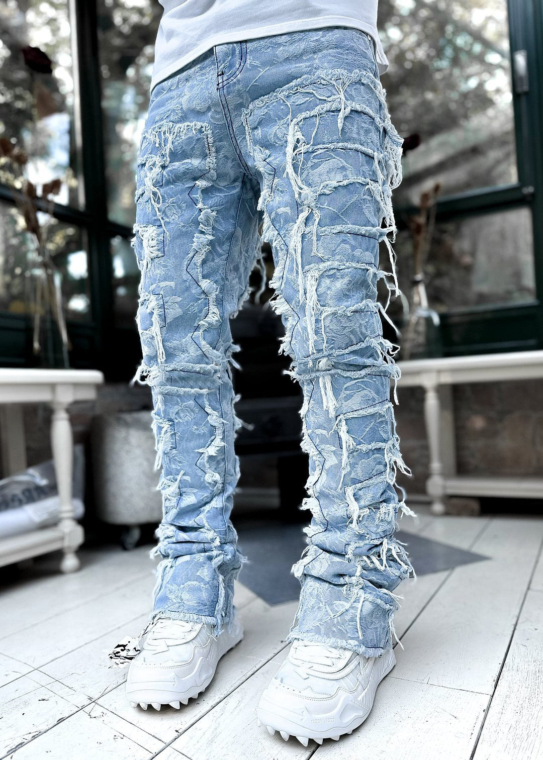 Patched Tight Fit Stacked Jeans