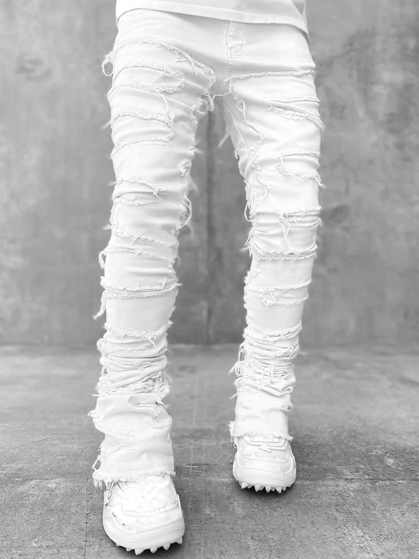 Patched Tight Fit Stacked Jeans