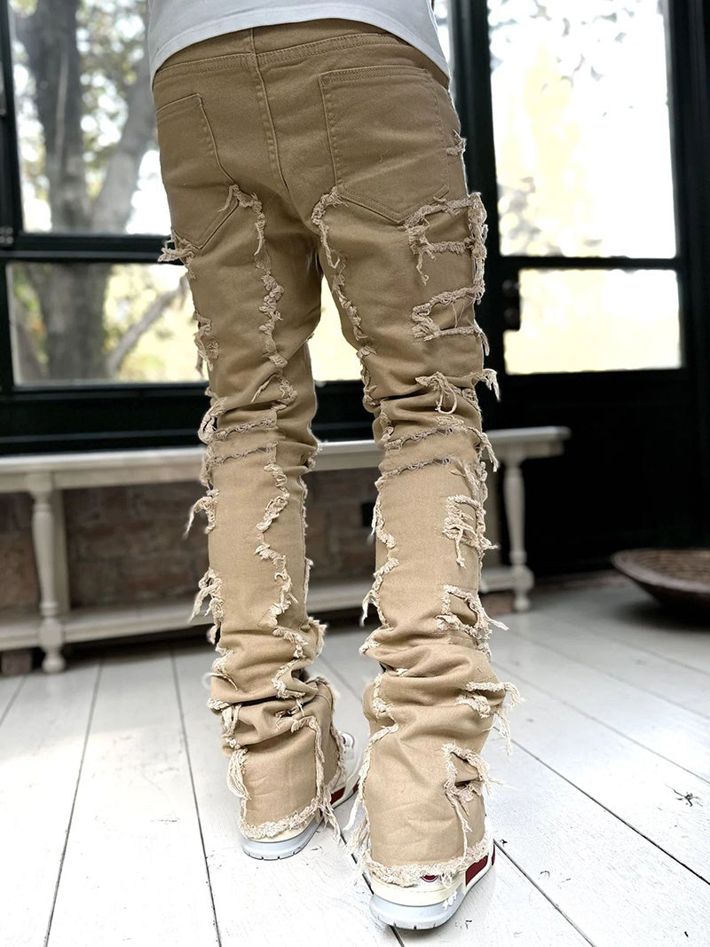 Patched Tight Fit Stacked Jeans