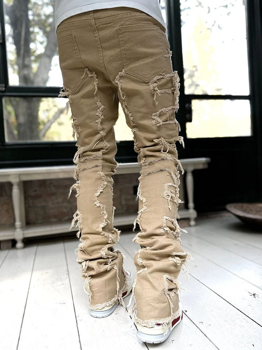 Patched Tight Fit Stacked Jeans